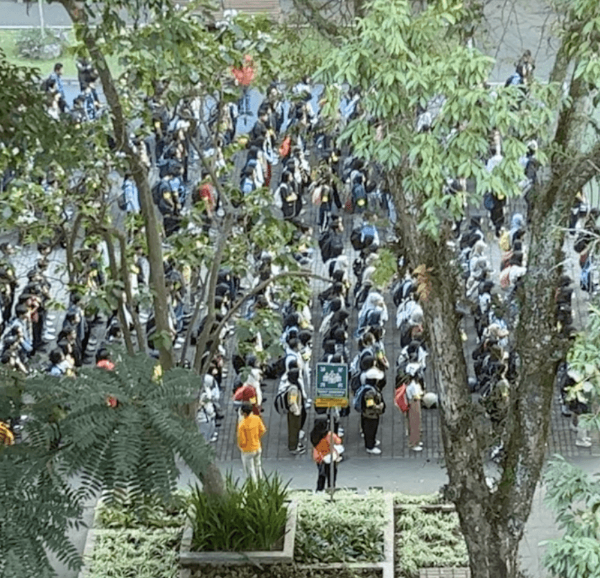 Residents and students gathered outdoors at the Institute of Technology Bandung during the project.